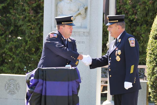 Years of service award given to John Fickes. 45 years.

Memorial Service NFD. September 9, 2012. Photo by Vincent P. Tuzzolino